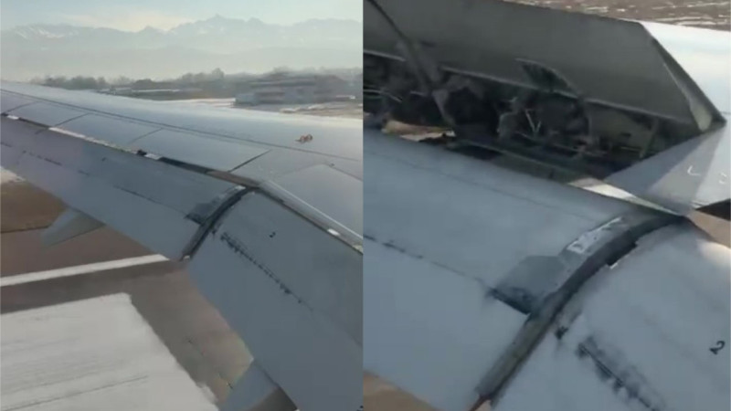 Необычное движение крыла самолета Air Astana в Almaty